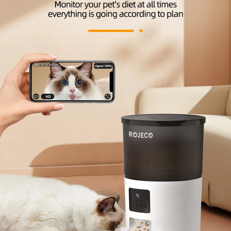 WTN Essentials Vessel Five SmartVision AI pet feeder in use with a cat and smartphone monitoring