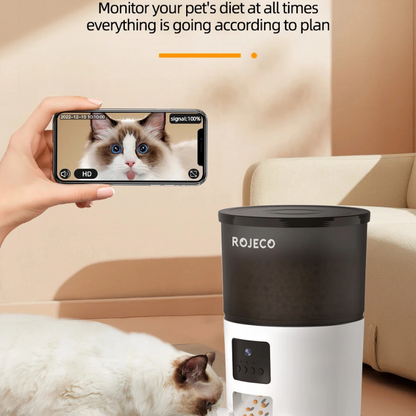 WTN Essentials Vessel Five SmartVision AI pet feeder in use with a cat and smartphone monitoring