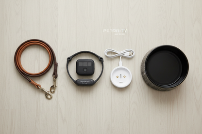 Vessel Tech Smart Pet Collar with charging dock, USB cable, and leash, arranged on a wooden surface.